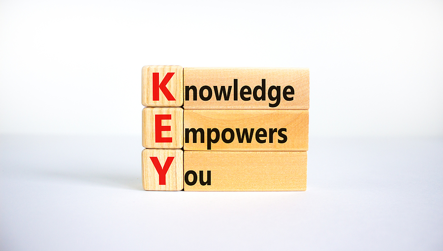 Key, Knowledge Empowers You Symbol. Wooden Blocks With Words ‘ke