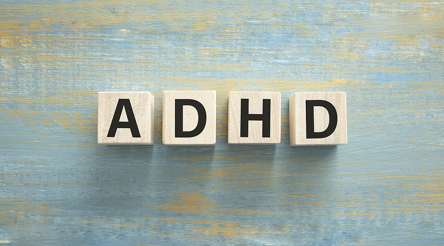 ADHD Abbreviation on ADHD cubes on a light background